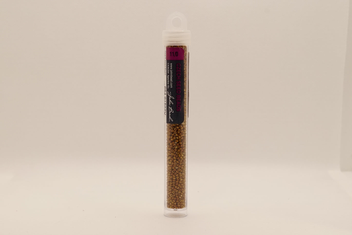28 - 11/0 Vial Opaque Travertine on Chalk White