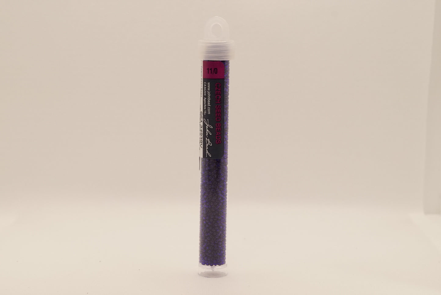 61 - 11/0 Vial Transparent Navy Blue