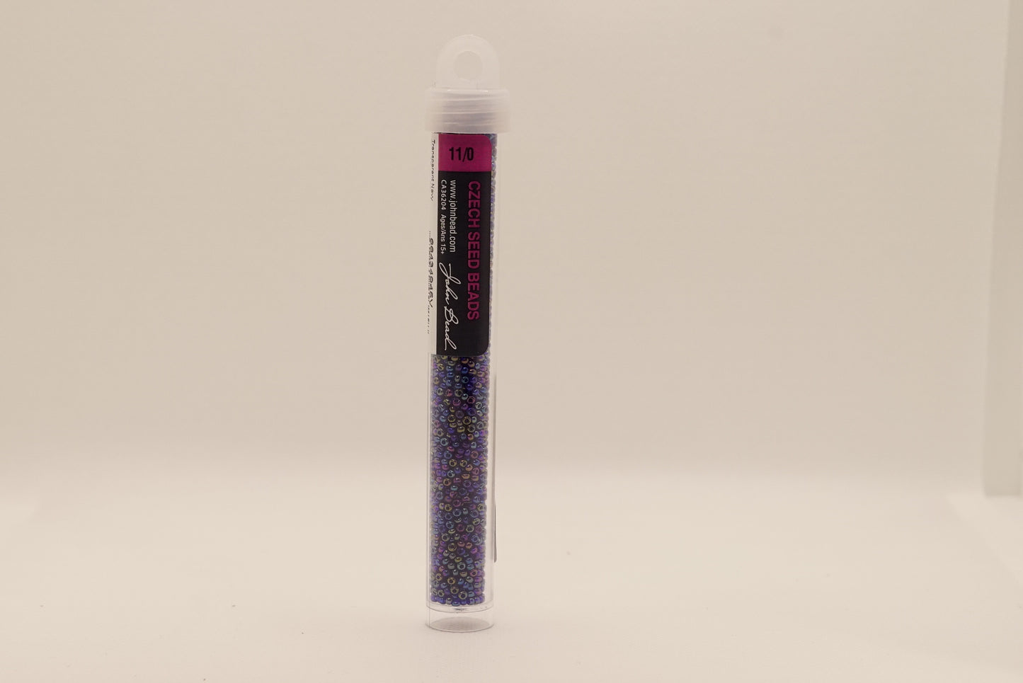 67 - 11/0 Vial Transparent Navy Blue AB