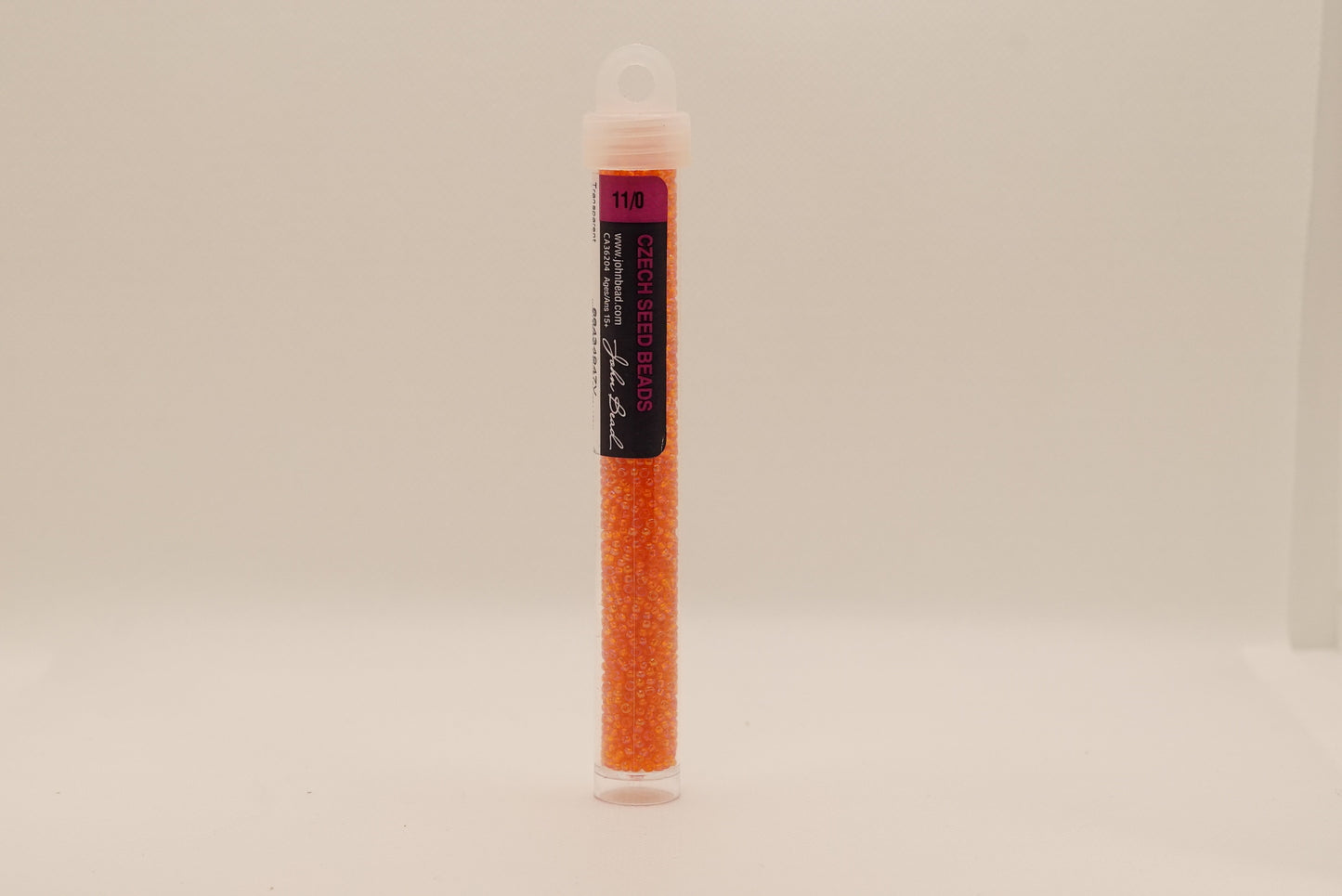69 - 11/0 Vial Transparent Orange AB