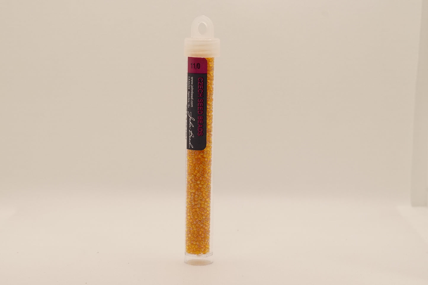 71 - 11/0 Vial Transparent Orange AB