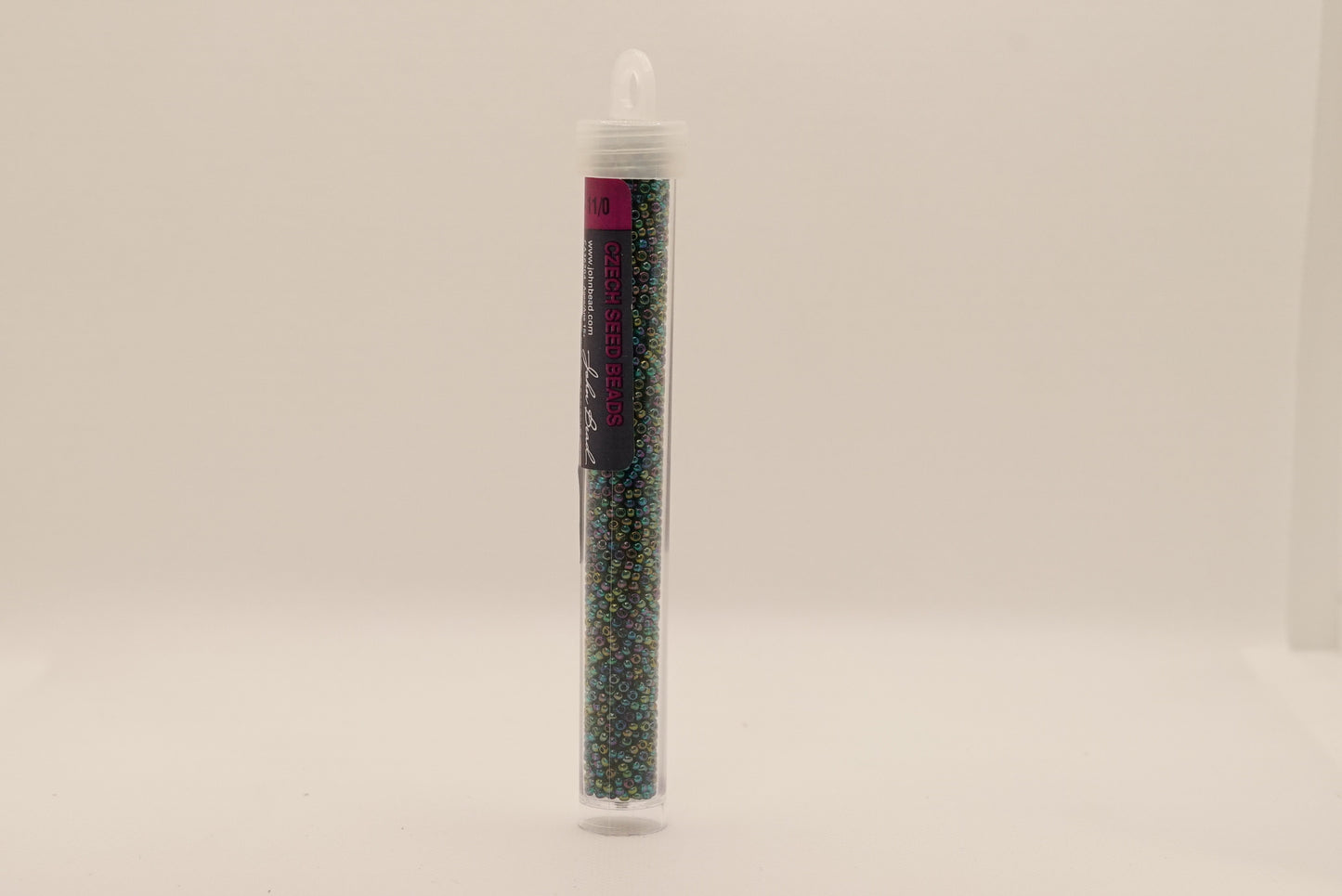72 - 11/0 Vial Transparent Teal AB