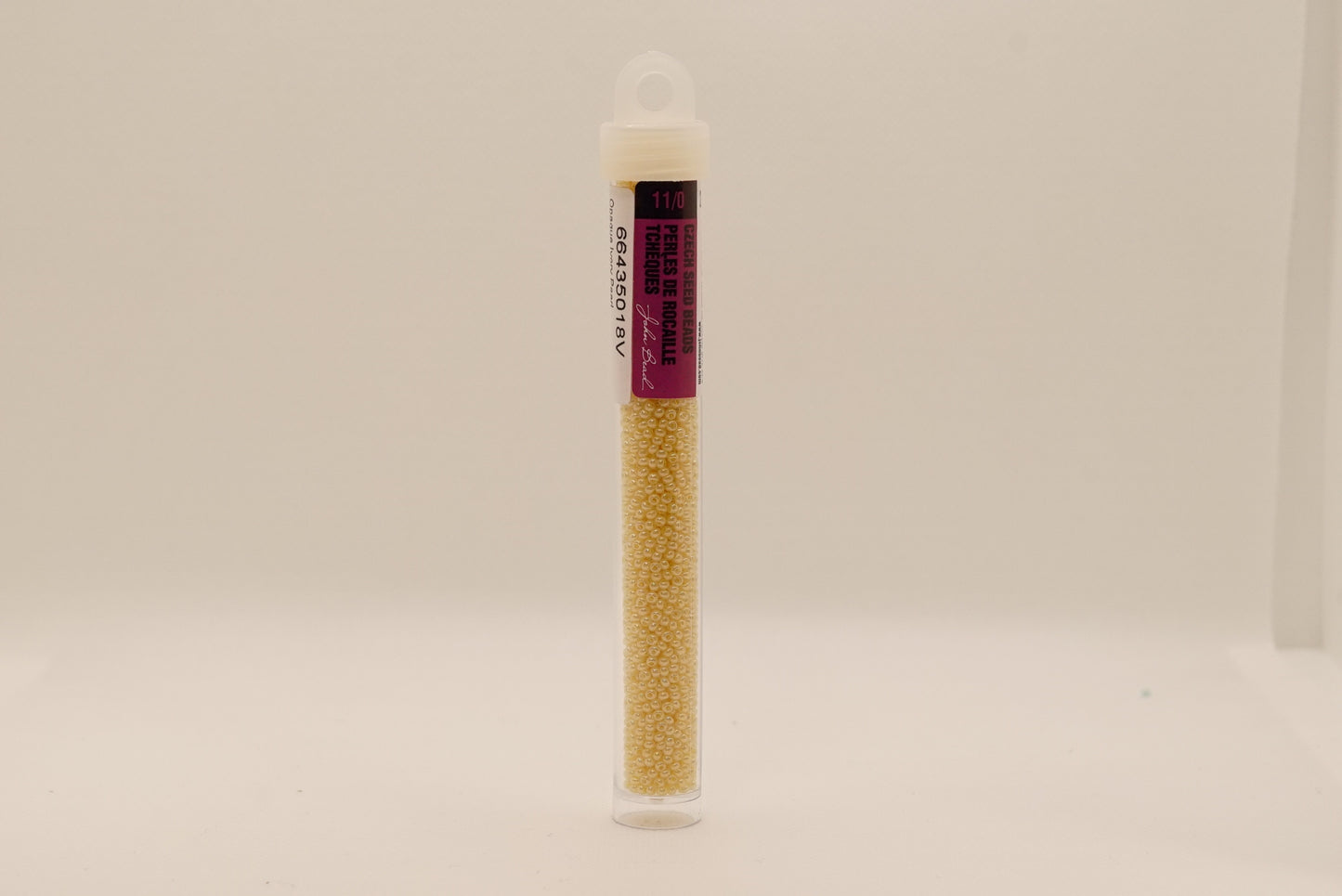 117 - 11/0 Vial Opaque Ivory Pearl