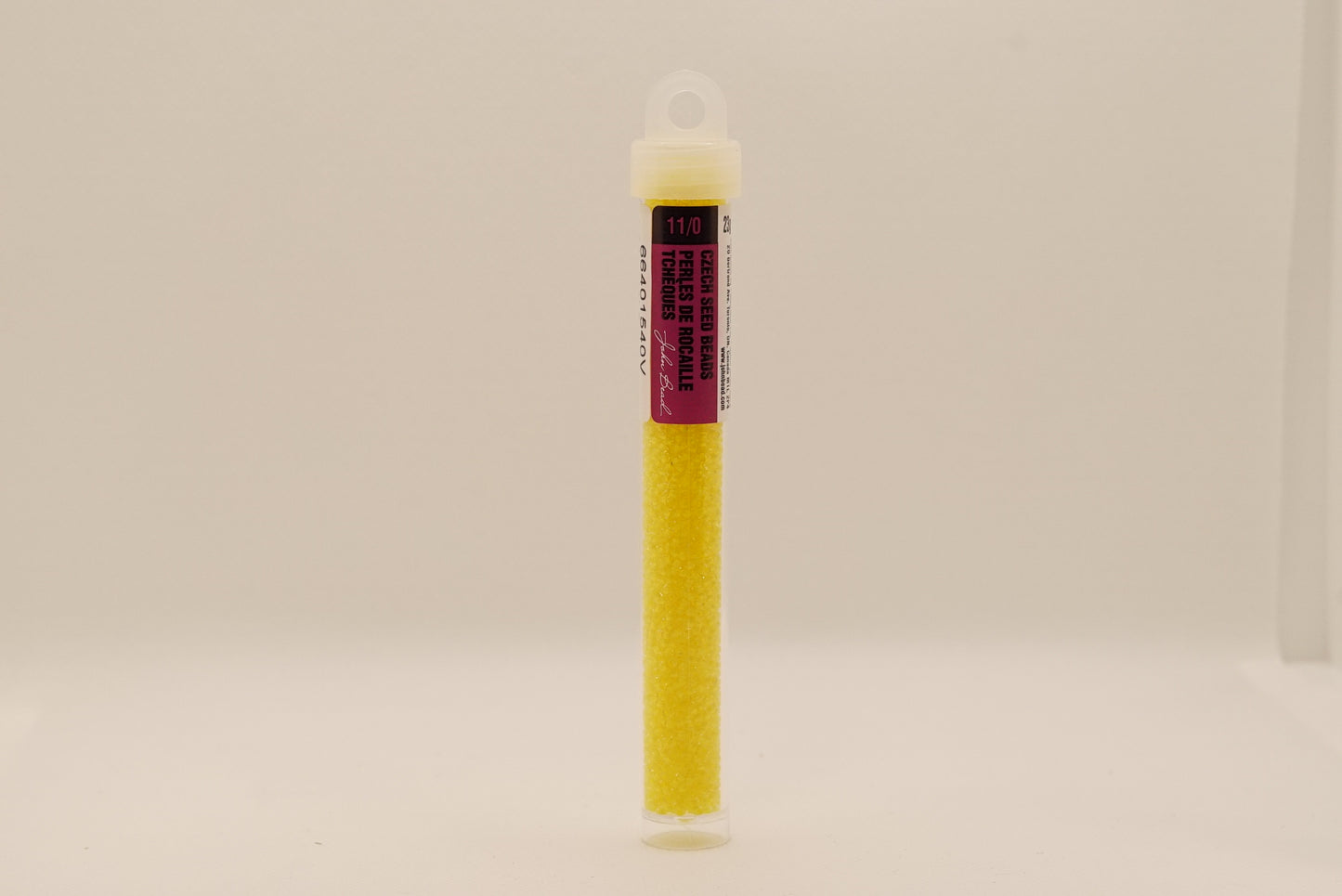 667 - 11/0 Crystal C/L Terra Intensive Yellow