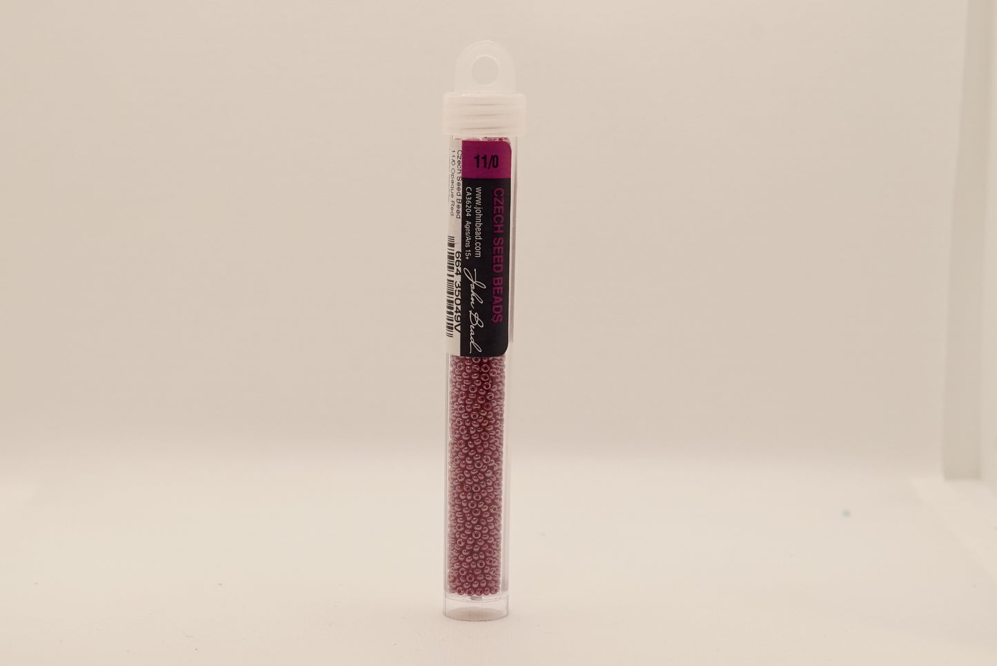 137 - 11/0 Vial Opaque Red Luster